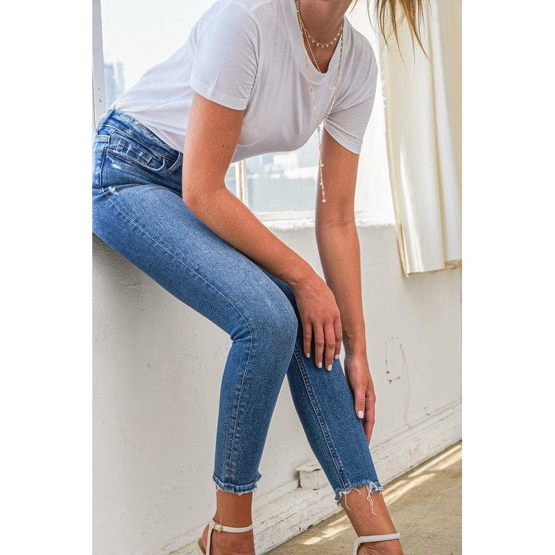 High rise broken hem ankle skinny